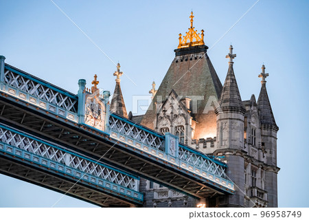 Iconic Tower Bridge connecting Londong with Southwark on the Thames River. Close up view of the details of the bridge. Iconic Tower Bridge connecting Londong with Southwark on the Thames River. Close up view of the details of the bridge. 96958749
