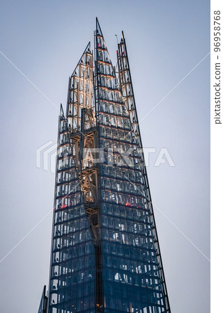 Close up view of the Shard skyscraper in London, UK. Close up view of the Shard skyscraper in London, UK. 96958768