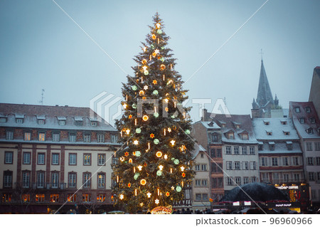 STRASBOURG, FRANCE - December 2017 - Christmas tree and decorations under snow in the city centre Place Kleber 96960966