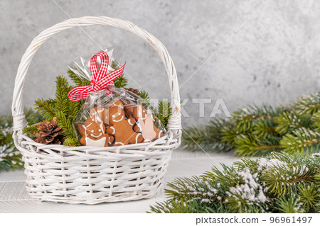 Basket with Christmas gingerbread cookies Basket with Christmas gingerbread cookies 96961497