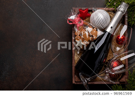 Box with Christmas gingerbread cookies and champagne Box with Christmas gingerbread cookies and champagne 96961569