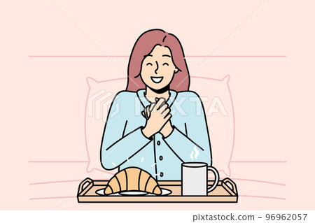 Girl is going to eat croissant, coffee in bed in morning. 96962057
