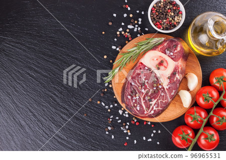 Cooking ingredients. Fresh raw meat beef steak with bone. 96965531