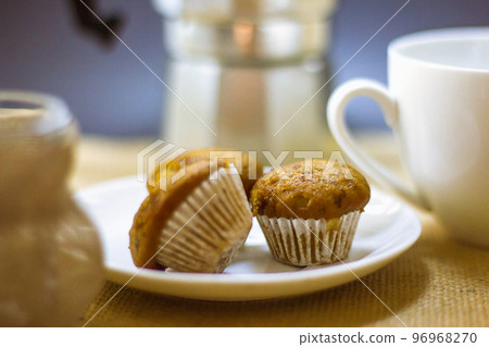 banana cake on a white plate eat with coffee 96968270