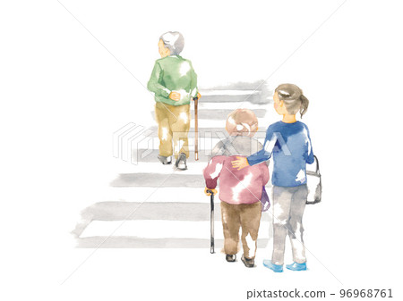 Elderly people crossing a pedestrian crossing and a woman accompanying them Elderly people crossing a pedestrian crossing and a woman accompanying them 96968761