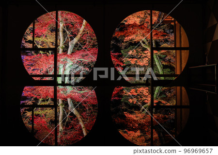 Autumn leaves and reflection of Kyoto Arashiyama seen from the window Autumn leaves and reflection of Kyoto Arashiyama seen from the window 96969657