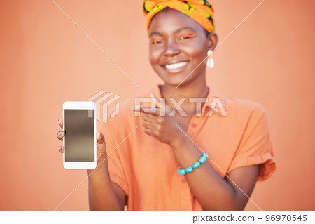 Mockup, black woman and blank smartphone screen for marketing, advertising and against brown studio background. Female, Jamaican lady and phone for social media, search internet and online website. 96970545