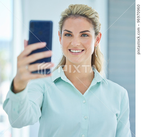 Face, business woman and phone selfie in office for happy memory. Tech, cellphone and female employee from Canada taking pictures on mobile smartphone for social media or profile picture in workplace 96970960