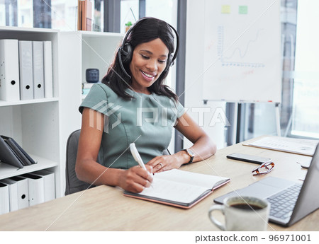 Black woman, notebook writing or call center headset in modern office, consulting company or telemarketing startup. Happy smile, customer support worker and laptop technology with contact us schedule Black woman, notebook writing or call center headset in modern office, consulting company or telemarketing startup. Happy smile, customer support worker and laptop technology with contact us schedule 96971001