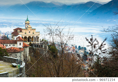 Madonna del Sasso in Orselina above city Locarno at lake Maggiore. Switzerland. Madonna del Sasso in Orselina above city Locarno at lake Maggiore. Switzerland. 96971154