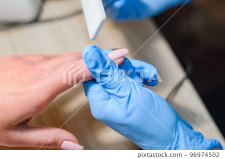 Manicure, nail extension, gel coating Manicure, nail extension, gel coating 96974502