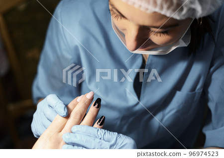 Manicure, nail extension, gel coating Manicure, nail extension, gel coating 96974523