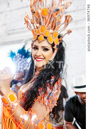 Samba dancer, party and rio de janeiro woman portrait happy about celebration and dancing. Talent, festival and mardi gras new year with music and smile about to perform carnival performance artist 96974746