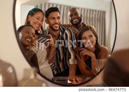 Group of friends, phone and mirror selfie for party, celebration or New Years together. Young people reflection, diversity or smartphone to connect, smile or social gathering to enjoy dinner or relax 96974773