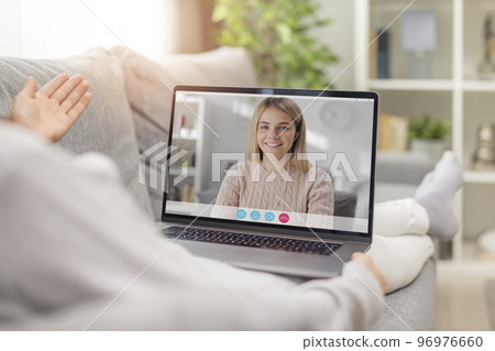 Pleasant talk using laptop Pleasant talk using laptop 96976660