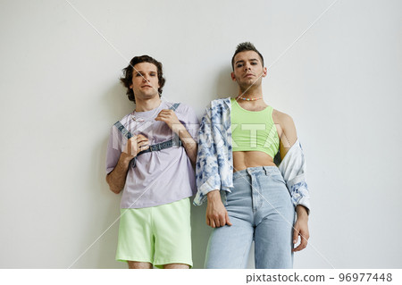 Portrait of two non binary men in fashion studio 96977448