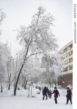 Snow. Winter. Streets covered in a white blanket of snow that covers all the elements that are on the street. Cold concept. Winter concept. Winter 2022. Photography. Snow. Winter. Streets covered in a white blanket of snow that covers all the elements that are on the street. Cold concept. Winter concept. Winter 2022. Photography. 96979191
