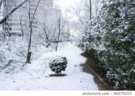 Snow. Winter. Streets covered in a white blanket of snow that covers all the elements that are on the street. Cold concept. Winter concept. Winter 2022. Photography. Snow. Winter. Streets covered in a white blanket of snow that covers all the elements that are on the street. Cold concept. Winter concept. Winter 2022. Photography. 96979203