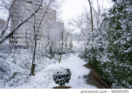 Snow. Winter. Streets covered in a white blanket of snow that covers all the elements that are on the street. Cold concept. Winter concept. Winter 2022. Photography. Snow. Winter. Streets covered in a white blanket of snow that covers all the elements that are on the street. Cold concept. Winter concept. Winter 2022. Photography. 96980095