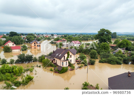 Aerial view of flooded houses with dirty water of Dnister river in Halych town, western Ukraine. 96980736