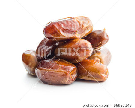Dried dates fruit isolated on white background. Dried dates fruit isolated on white background. 96983145