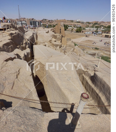 A panorama view of an unfinished obelisk in a quarry near Aswan, Egypt in summer 96983426