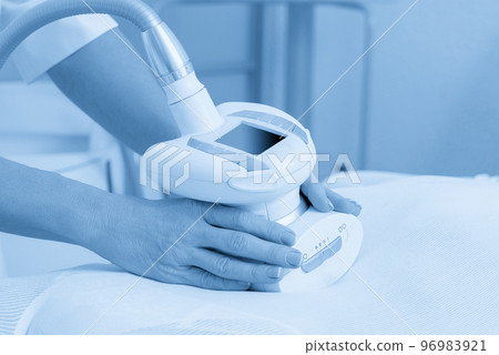 Close up view of anti cellulite massage in a spa salon. LPG, and body contouring treatment in clinic. 96983921