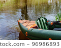 Kayaking trip on the river. Rafting in kayaks. Active recreation on the water. 96986893