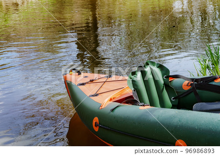 Kayaking trip on the river. Rafting in kayaks. Active recreation on the water. Kayaking trip on the river. Rafting in kayaks. Active recreation on the water. 96986893