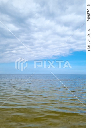 The water background of nature. A sunny day on the shores of the Baltic Sea. The water background of nature. A sunny day on the shores of the Baltic Sea. 96987046