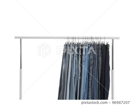 Rack with different jeans isolated on white 96987207