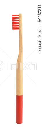 Bamboo toothbrush with red bristle isolated on white 96987211