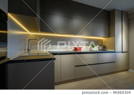 Modern grey luxurious kitchen furniture, closeup to worktop Modern grey luxurious kitchen furniture, closeup to worktop 96988304