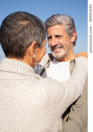 Happy senior couple spending time at seashore Happy senior couple spending time at seashore 96991680