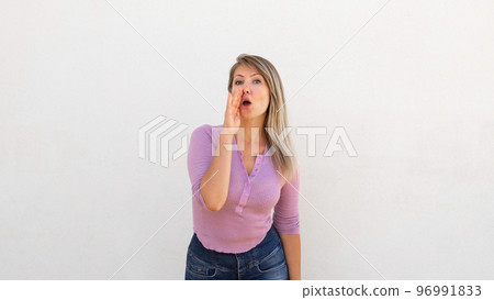 Serious Caucasian woman telling rumors Serious Caucasian woman telling rumors 96991833