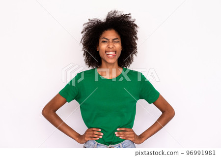 Portrait of funny young woman sticking tongue and winking Portrait of funny young woman sticking tongue and winking 96991981