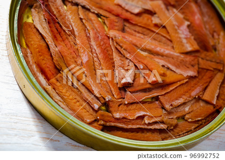 Salted anchovy fillets in oil, traditional spanish canned food Salted anchovy fillets in oil, traditional spanish canned food 96992752