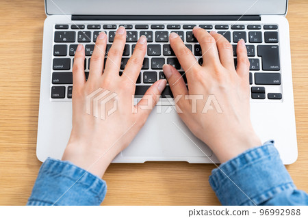 Hands of women using laptops [Parts cut] 96992988