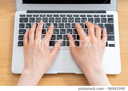 Hands of women using laptops [Parts cut] 96992990