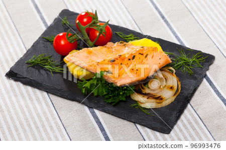 Slate with tender trout fillet, potatoes Slate with tender trout fillet, potatoes 96993476