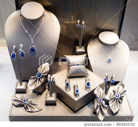 Gold jewelry at showcase of jewelry shop 96993550