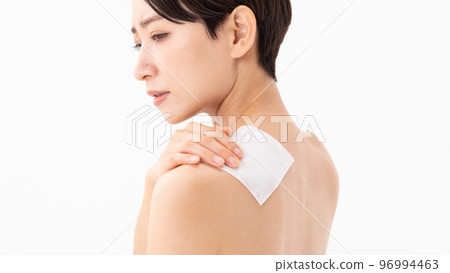 A woman applying a poultice A woman applying a poultice 96994463