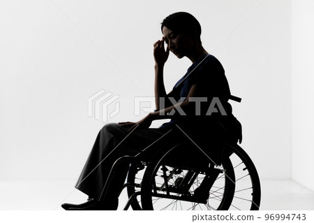Female wheelchair silhouette 96994743