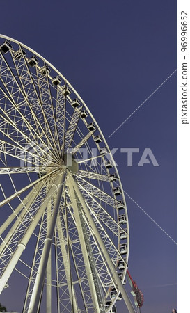 Ferris wheel in the park at the Downtown Miami at sunset 96996652