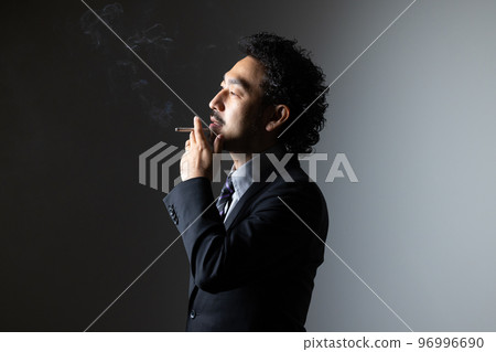 bearded man smoking bearded man smoking 96996690