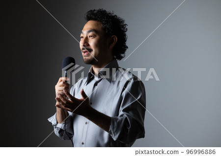 bearded man with microphone 96996886