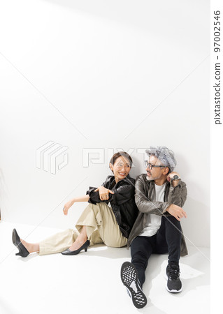 Portrait of a middle-aged couple in plain clothes 97002546