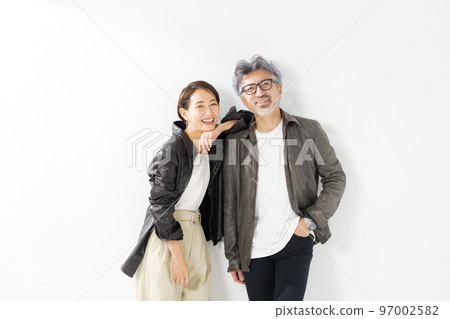 Portrait of a middle-aged couple in plain clothes 97002582