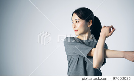 Women stretching 97003025