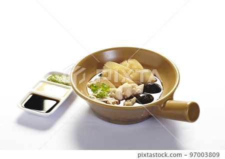 Shark's fin soup in a clay pot. Shark's fin soup in a clay pot. 97003809